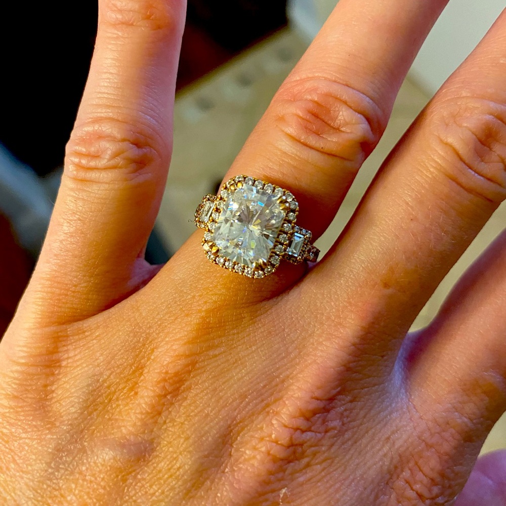 Moissanite and diamond engagement ring